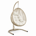 Chaise suspendue en rotin synthétique avec coussin beige